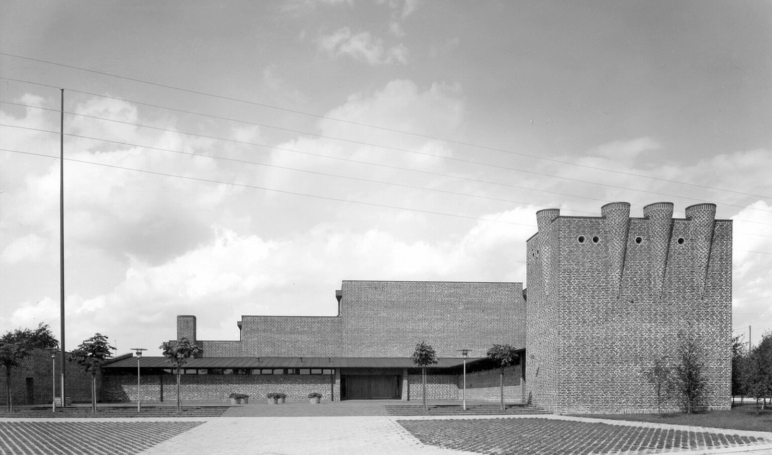 Islev Church in black and white, with bricks and clouds, by Keld Helmer Petersen